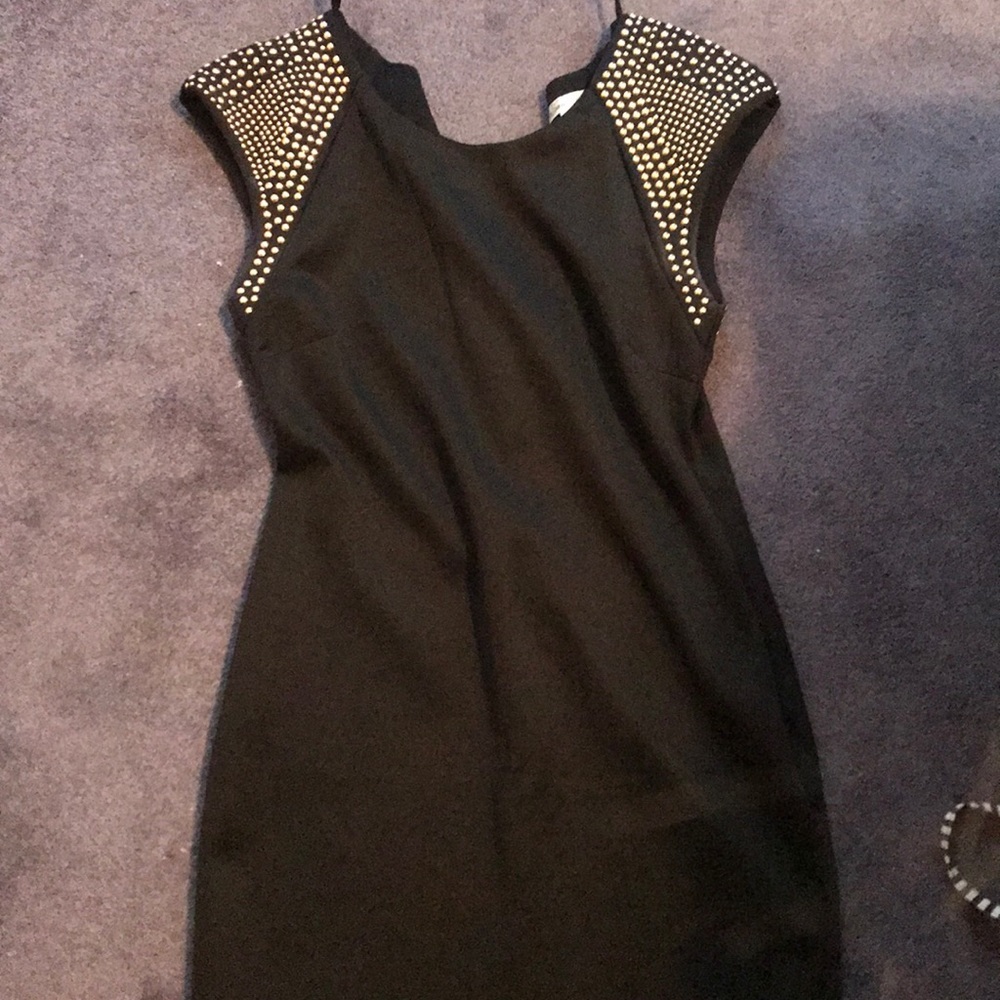 Black body-con dress with studded sleeves